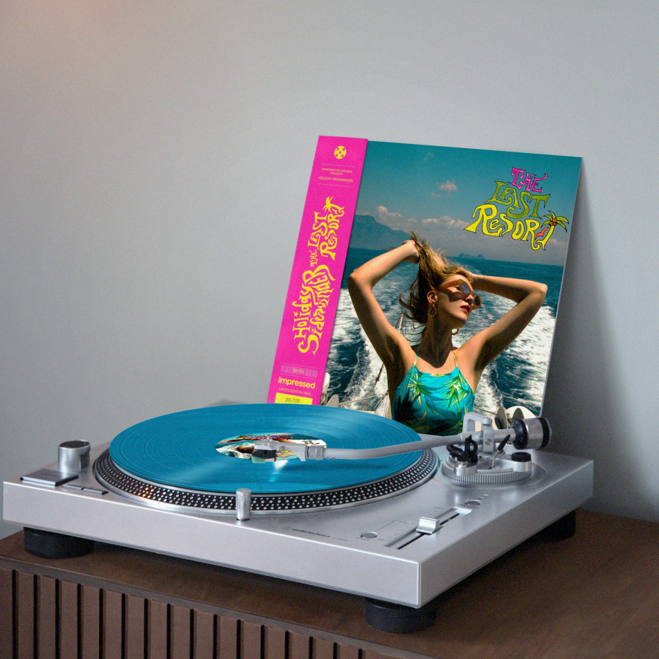 Holiday Sidewinder, Holiday Sidewinder vinyl, The Last Resort vinyl, teal vinyl, limited edition vinyl, vinyl on turntable,  